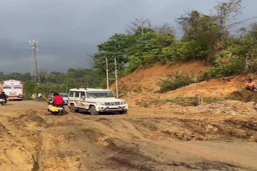 Minister Tinku Roy’s Vehicle Stuck on Muddy NH-208, Exposes Poor Road Condition