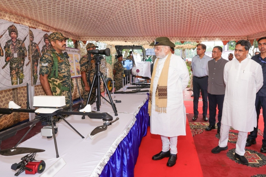 Union Home Minister Shah Reviews BSF Weapons at Tripura Border Outpost